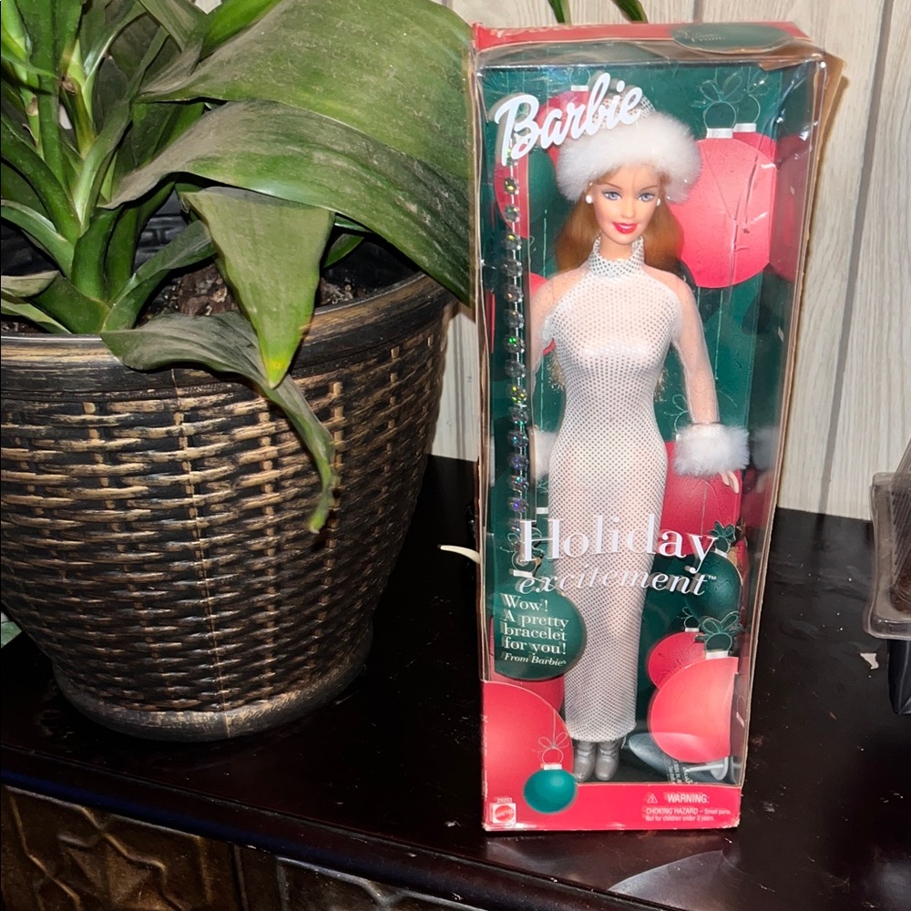 Collectible NIB 2001 Barbie Holiday Excitement w/bracelet.